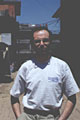Александр Абрамов на улице в Катманду в футболке Mountain.RU